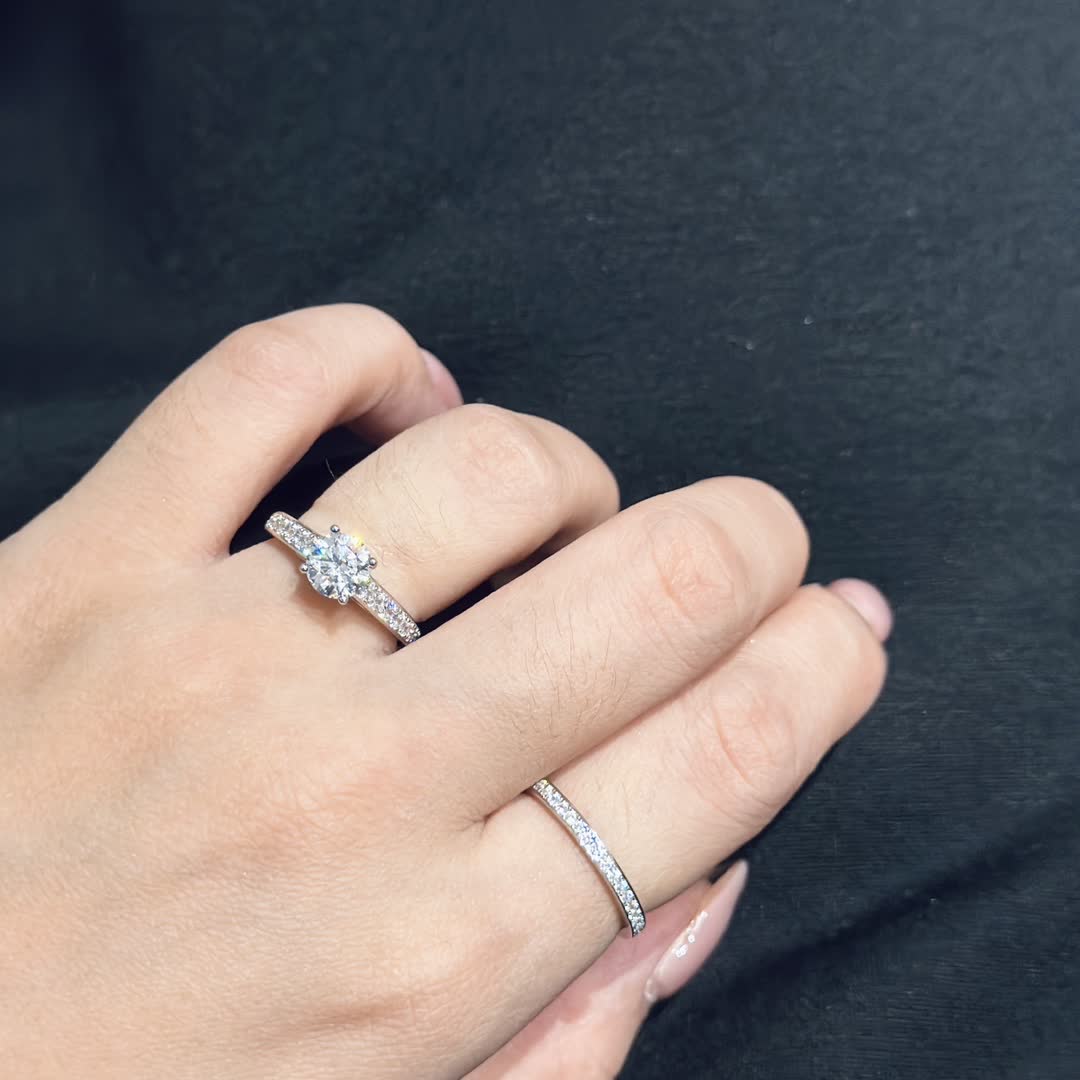 Tiffany & Co. Solitaire Ring with Diamond Band